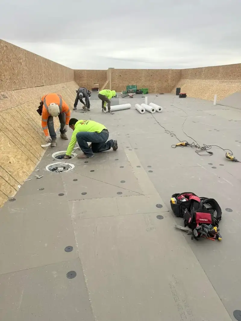 TPO flat roof installation crew in Haines City FL — commercial low-slope roofing Polk County licensed contractor